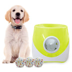 Green dog ball launcher shown beside a golden retriever puppy