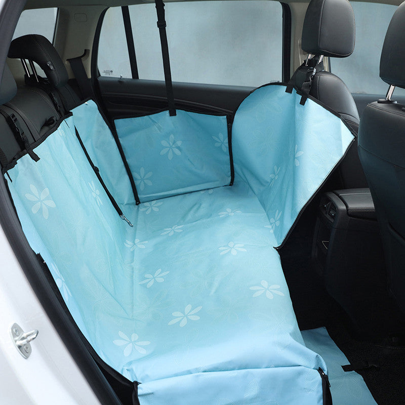 Blue dog car seat cover fitted in a rear seat