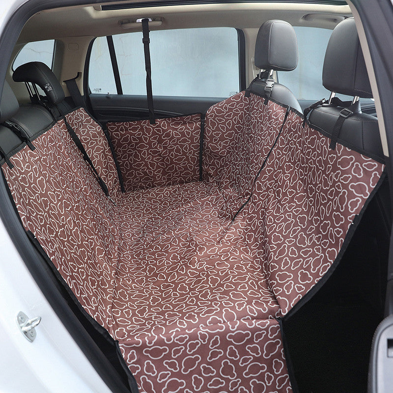 Brown dog car seat cover fitted in a rear seat