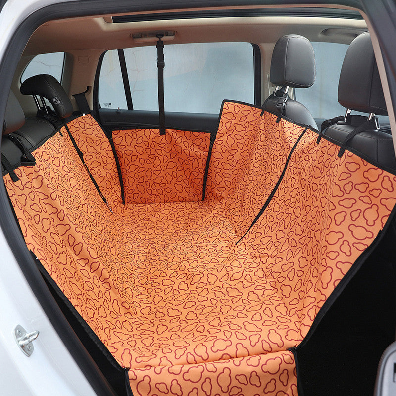 Orange dog car seat cover fitted in a rear seat