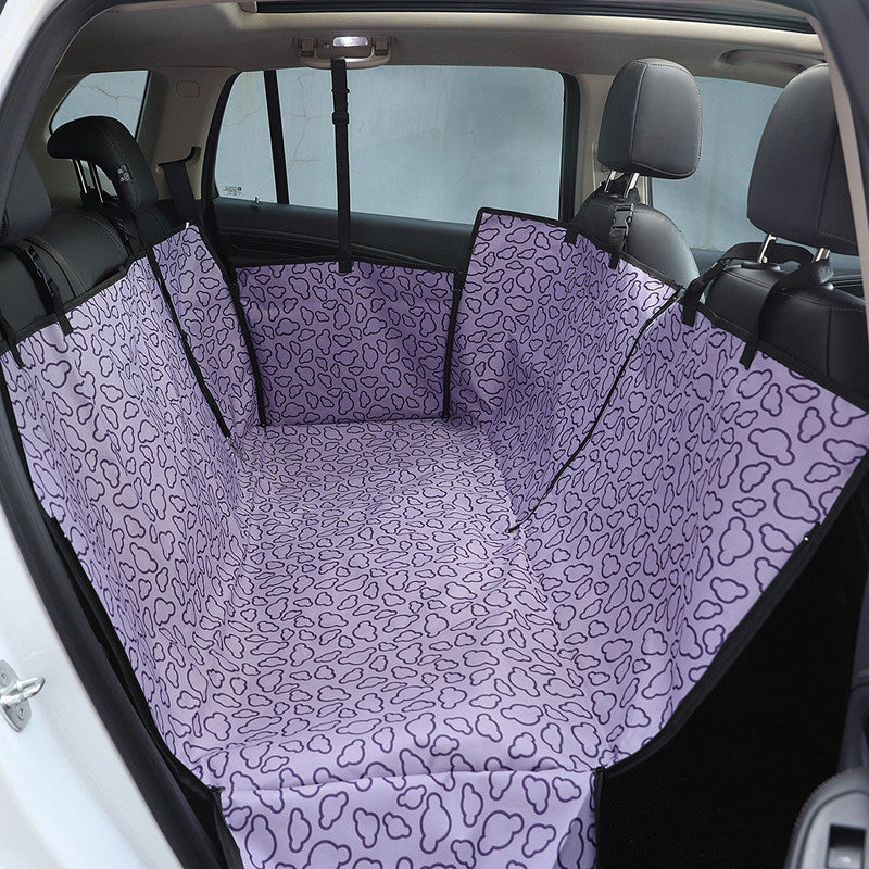 Purple dog car seat cover fitted in a rear seat